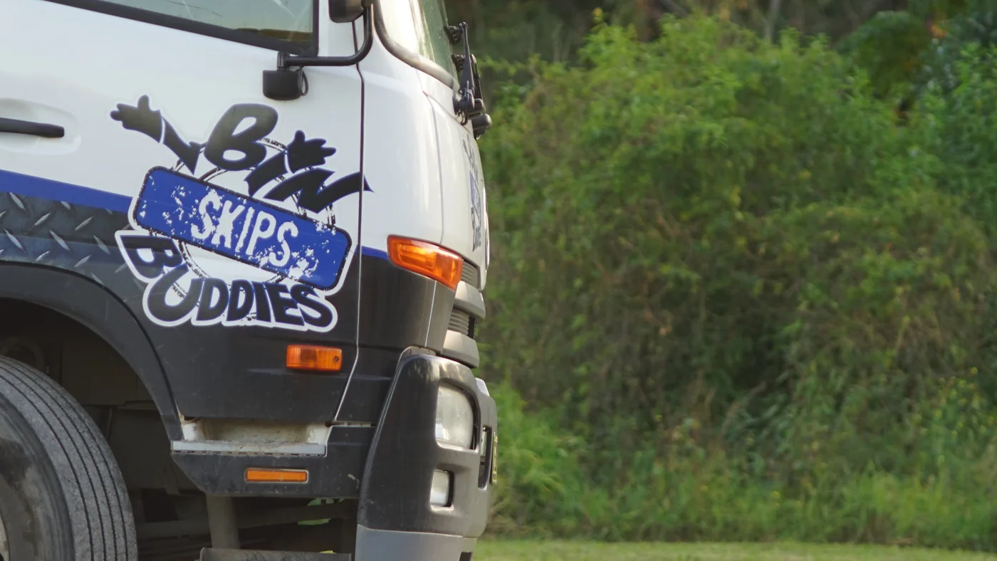 Bin Buddies truck and orange skip bin